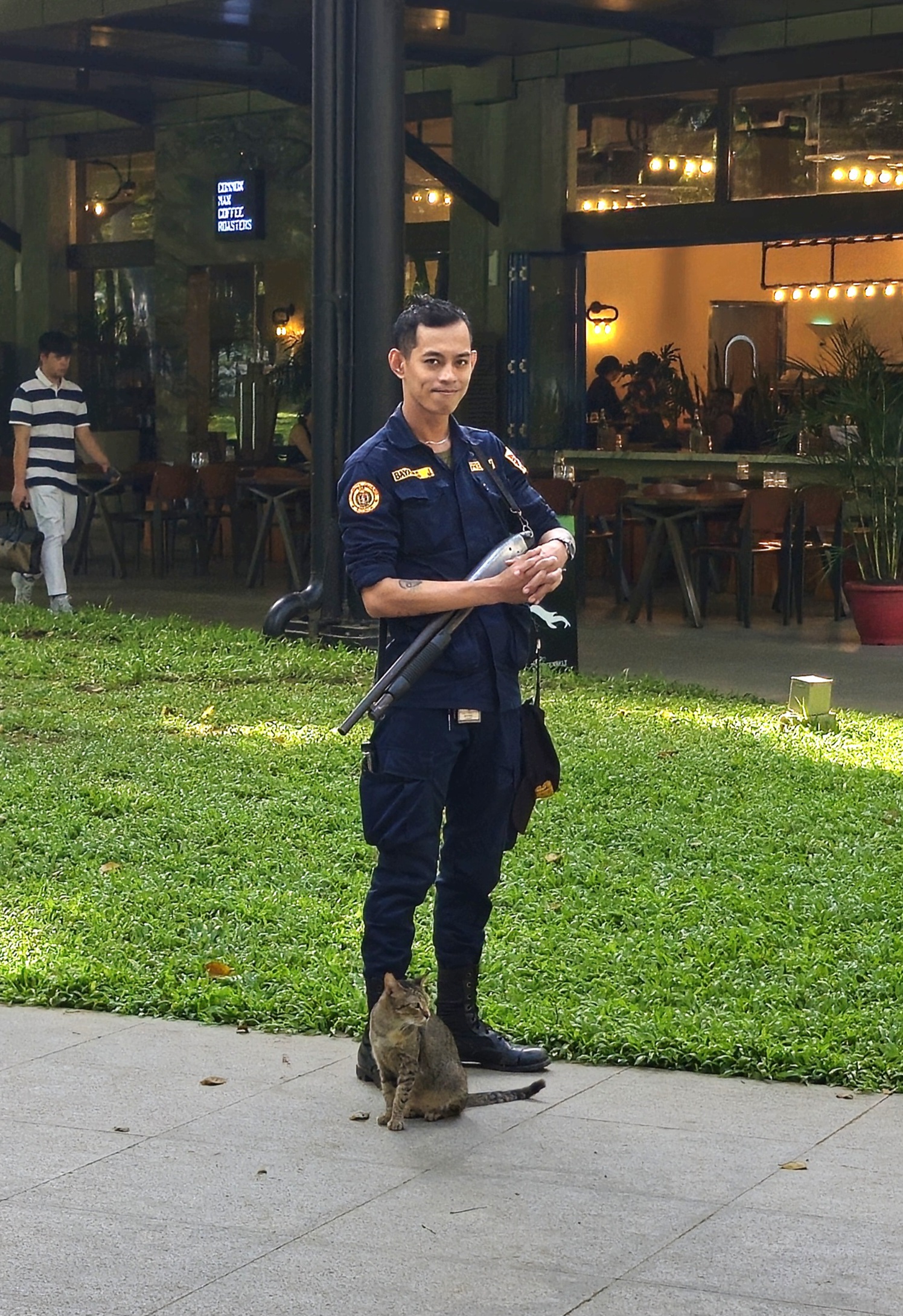 security guard with cat at the park